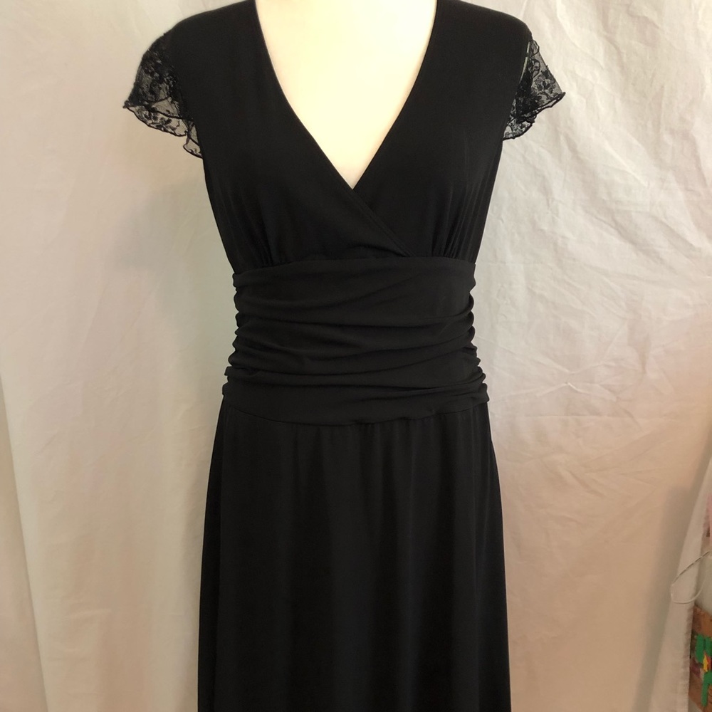 Moda International black dress with lace sleeves.